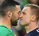 City goalkeeper Dean Bouzanis and Victory star Besart Berisha come face to face.