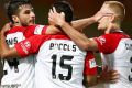 Terry Antonis, Kearyn Baccus and Jack Clisby of the Wanderers celebrate the goal of Emilio Martinez.