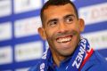 Argentine striker Carlos Tevez attends his first presser after joining Shanghai Shenhua in Shanghai on January 21.