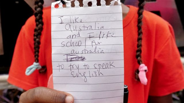 Samar, 8, an asylum seeker from Sudan at the protest outside the UNHCR in Jakarta on Monday.