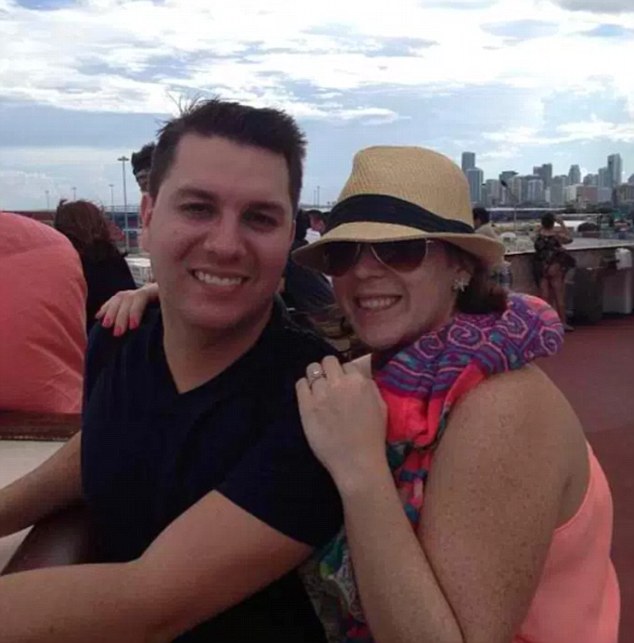 A selfie with gusto! This couple found their romantic selfie has been hijacked by a woman wearing a flimsy dress on a windy day