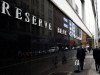 Pedestrians are seen walking past the Reserve Bank of Australia (RBA) in Sydney, Tuesday, April 7, 2015. Economists are tipping the Reserve Bank to cut the official cash rate to a record low of two percent at it's meeting today. (AAP Image/Dan Himbrechts) NO ARCHIVING