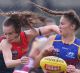 Rain, hail or shine, women are finally playing top-level footy.