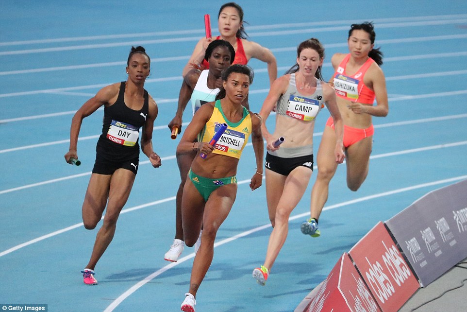 Morgan Mitchell of Australia (centre) competes in the Mixed 2x300 Metre Relay