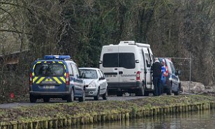 The boy's body was found overnight by a canal in northern France