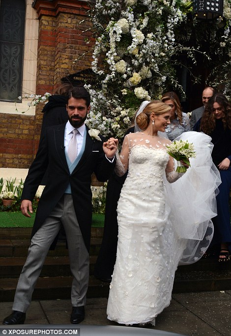 The couple looked overjoyed after they left the cathedral