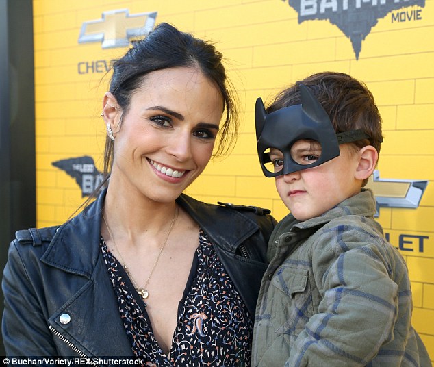 Proud mom: The 36-year-old Fast and the Furious franchise vet beamed with pride as he son hammed it up for the cameras on the black and yellow carpet