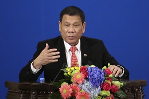 Philippine President Rodrigo Duterte delivers a speech during the Philippines-China Trade and Investment Forum at the Great Hall of the People in Beijing Thursday, Oct. 20, 2016.