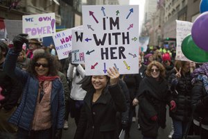 File - Demonstrators march up 5th Avenue during a women's march, Saturday, Jan. 21, 2017, in New York.