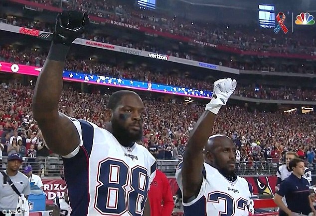 McCourty's (right) decision to skip out on meeting Donald Trump follows in the footsteps of teammate Martellus Bennett (left), who said he wouldn't attend because he doesn't support the president. The two are pictured in September with fists raised high to 'start the conversation' in regards to social injustice