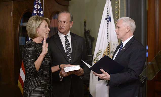 Mike Pence swears in billionaire Betsy DeVos