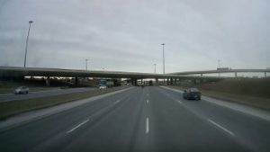 Cyclist crossing Hwy. 401 captured in dash cam video