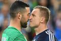 City goalkeeper Dean Bouzanis and Victory star Besart Berisha come face to face.