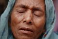 Sufia Begum, a Rohingya who crossed over to Bangladesh from Myanmar's Rakhine state in late November cries as she ...