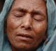 Sufia Begum, a Rohingya who crossed over to Bangladesh from Myanmar's Rakhine state in late November cries as she ...