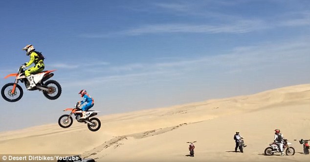 On the Fury Road: The video's uploader wrote: 'He landed on the hood but thankfully rode away like a boss'