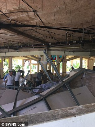 The battered ceiling which fell on guests