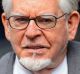 Rolf Harris has been found not guilty on three charges of indecent assault.