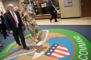 President Donald Trump is briefed by Gen. Joseph Votel, commander of U.S. Central Command Commander, during a visit at MacDill, AFB, FL, Feb. 6, 2017