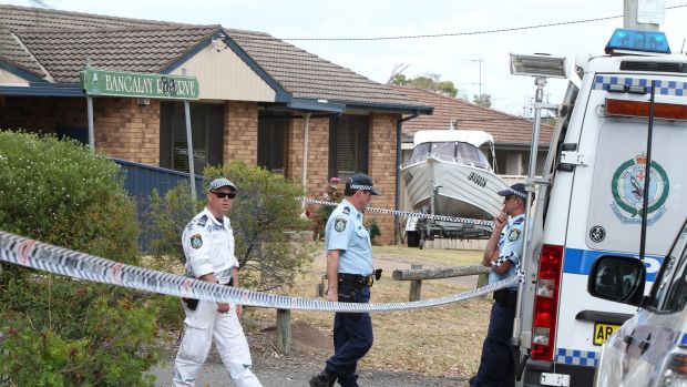 Police on scene where a body was discovered in Bangalay Reserve at Windale in 2014.