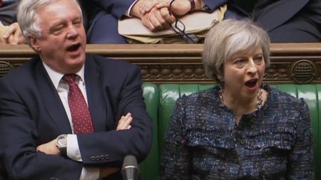 In a still image taken from footage broadcast by the UK Parliamentary Recording Unit (PRU) on February 8, 2017 British Prime Minister Theresa May (R) and British Secretary of State for Exiting the European Union (Brexit Minister) David Davis (L) shout 'aye' in the House of Commons in favour of a third reading of the EU Notification of Withdrawl Bill during the formal process of debating and voting on the bill in the House of Commons in central London on February 8, 2017. British MPs look set to approve a bill on February 8, 2017 empowering Prime Minister Theresa May to start Brexit negotiations, in a major step towards Britain leaving the European Union. Seven months after the historic referendum vote to leave the 28-nation bloc, the House of Commons is expected to grant approval for May to trigger Article 50 of the EU's Lisbon Treaty. The main vote on the Bill is expected later on the evening of February 8.  / AFP PHOTO / PRU / - / RESTRICTED TO EDITORIAL USE - MANDATORY CREDIT " AFP PHOTO / PRU " - NO MARKETING NO ADVERTISING CAMPAIGNS - NO RESALE - NO DISTRIBUTION TO THIRD PARTIES - 24 HOURS USE - NO ARCHIVES -/AFP/Getty Images