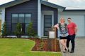 Amy and James Lewis; Aura's first residents in their new suburb of Baringa.