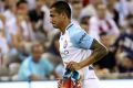 Tim Cahill leaves after being sent off against Melbourne Victory.