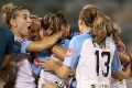 Jessica Fishlock of Melbourne City celebrates scoring the matchwinner with teammates.