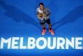 Roger Federer celebrates his victory