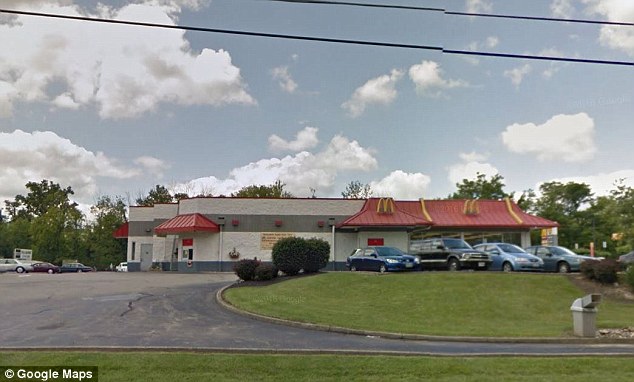 His lawyer said he dropped the children off with their grandfather after he left the McDonald's (pictured). He is charged with felonious assault, theft and multiple counts of abduction and kidnapping