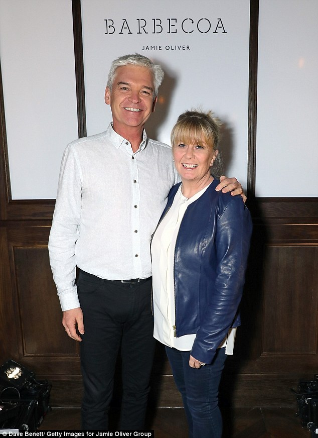 Date night: Phillip Schofield, 54, enjoyed a rare public outing with his wife Stephanie as they attended the launch of Jamie Oliver's latest restaurant