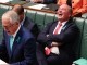 Barnaby Joyce laughs while Malcolm Turnbull speaks