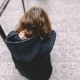 Teenage girl sitting on steps