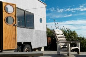 Eleven handmade porthole-style windows feature throughout the truck.