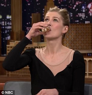 Down the hatch: The gorgeous blonde gave Fallon a run for his money in his random words drinking game