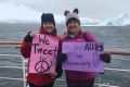 Protesters at the Women's March Antarctica.