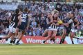 A packed crowd at Princes Park watches Carlton play Collingwood on Friday.