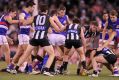 Congestion in the pack during a Collingwood-Bulldogs game last season. The AFL feels it is increasing this year.