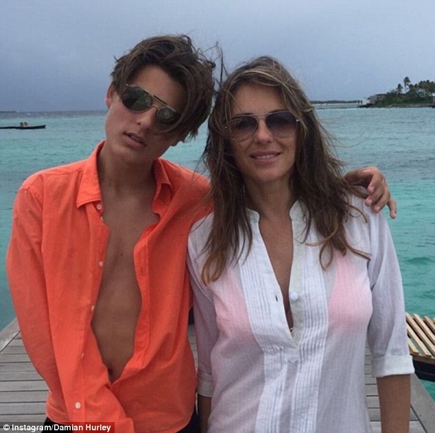 Fun in the sun: The actress was joined on her winter sunshine break by her son Damian, 14, who poked fun at his advancing height and joked he was overtaking his mother