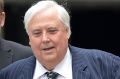 Clive Palmer arrives at court in September to answer questions over the fall of Queensland Nickel.