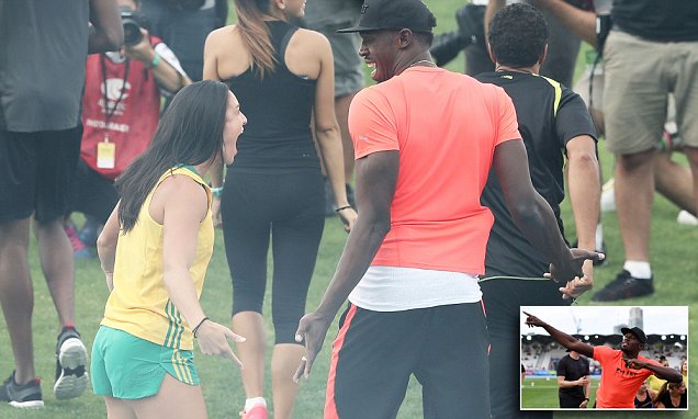 Michelle Jenneke and Usain Bolt share a joke 