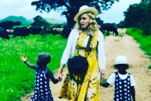 Madonna with her twin daughters. 