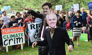 Activists in Melbourne protest against the federal government and Indian company Adani’s proposed Carmichael coalmine on 5 December 2016. More than 11,000 people have so far pledged to join the campaign against the Queensland mine.