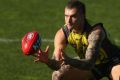 Dustin Martin, along with teammate Alex Rance, has been made a life member of the Richmond Football Club.