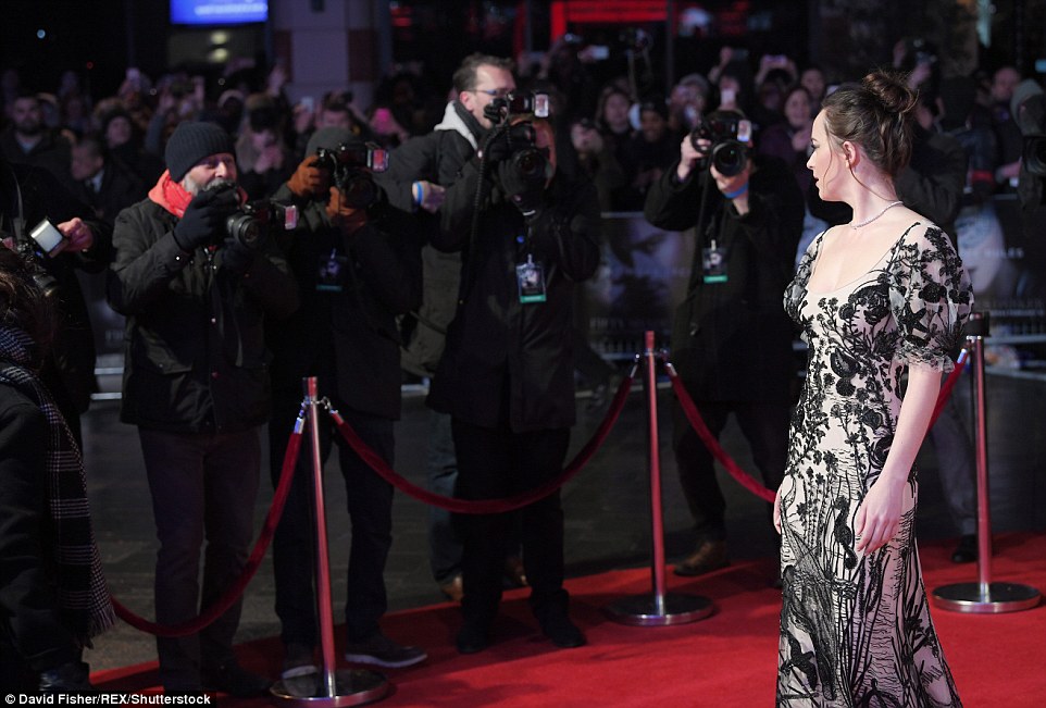 Centre of attention: All eyes were on Dakota as she made her grand arrival at the long-awaited London premiere 