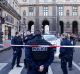 Police officers cordon off the area next to the Louvre after a soldier opened fire.