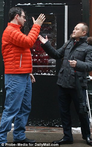 They are seen outside the bar preparing to shake hands before leaving