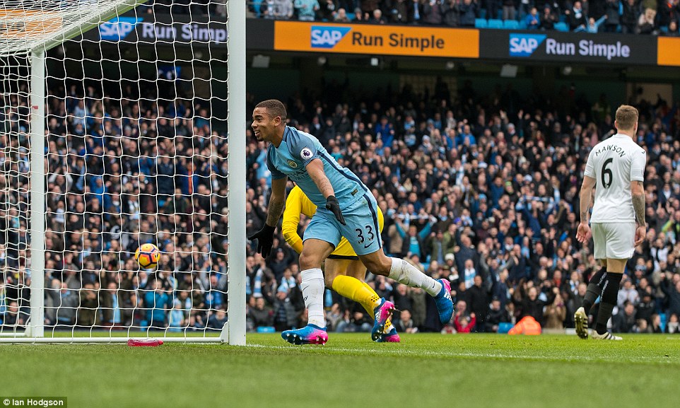 The Brazilian teenager wheels away in celebration after scoring his second Premier League goal for his new side City