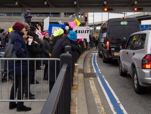 Protest at John F. Kennedy International Airport (JFK), Terminal 4, in New York City, against Donald Trump's executive order signed in January 2017 banning citizens of seven countries from traveling to the United States (the executive order is also known as "Protecting the Nation from Foreign Terrorist Entry into the United States").