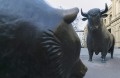 Two statues, depicting a Bear, left, and a Bull are seen standing outside the entrance to the Frankfurt Stock Exchange ...